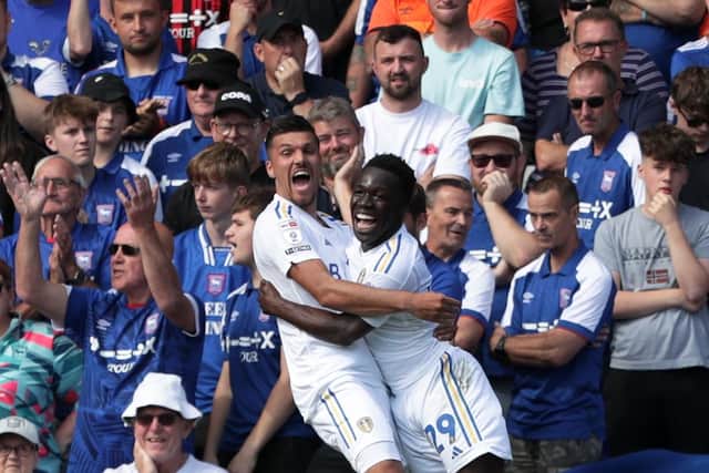 Leeds United's Joel Piroe (left) celebrates with team mate Wilfried Gnonto (right) after scoring scoring his side’s third goal during the Sky Bet Championship match at Portman Road, Ipswich. (Photo credit: George Tewkesbury/PA Wire)