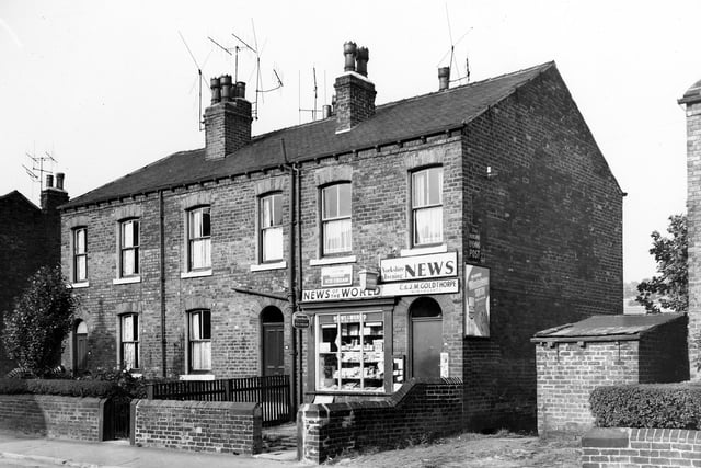 A block of three properties on Cow Close Road in October 1969. Number 46 is a newsagents run by C. & J.M. Goldthorpe. Advertisements for News of the World and the Yorkshire Evening News are visible along with posters for Lyons Maid ice cream and Windowlene spray.