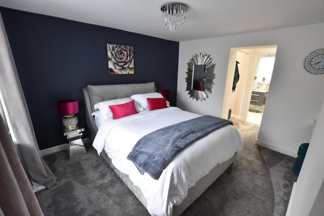 To the first floor, a landing gives access to a beautiful master bedroom which has four skylight windows, opposite, there is also a dressing room with a good range of built-in storage and dressing table and wardrobes.