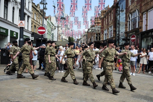 Soldiers make their way through Leeds during the parade.