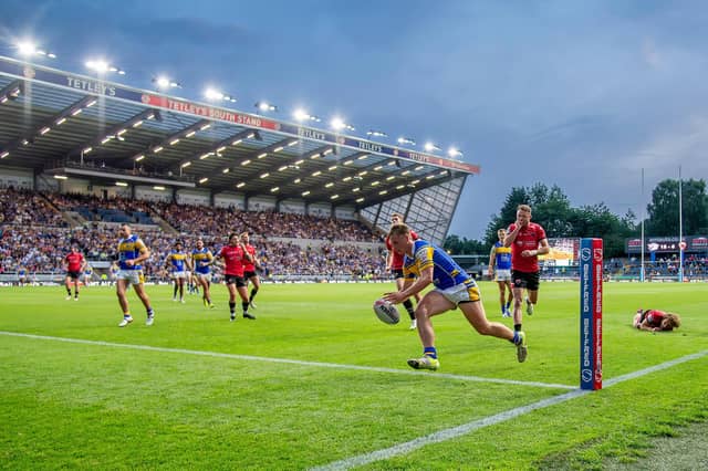 Alfie Edgell completes his hat-trick in Leeds Rhinos' win against Salford Red Devils at AMT Headingley. Picture by Allan McKenzie/SWpix.com.