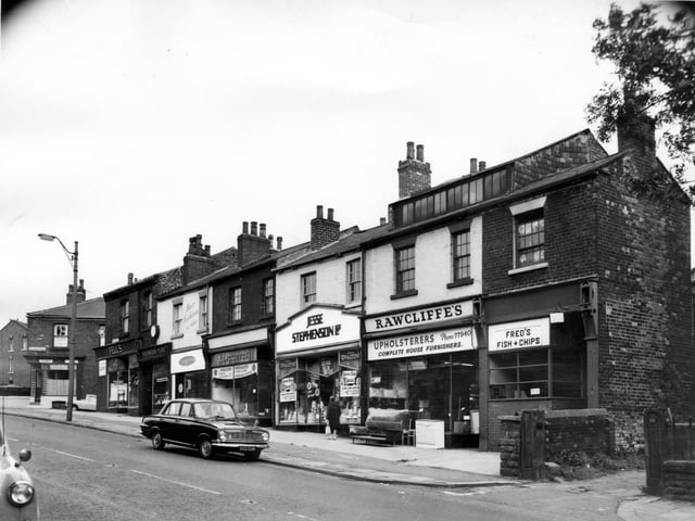 Beeston Road to a parade of shops, some with residential accommodation above. Far left is the junction with South Mount Street.