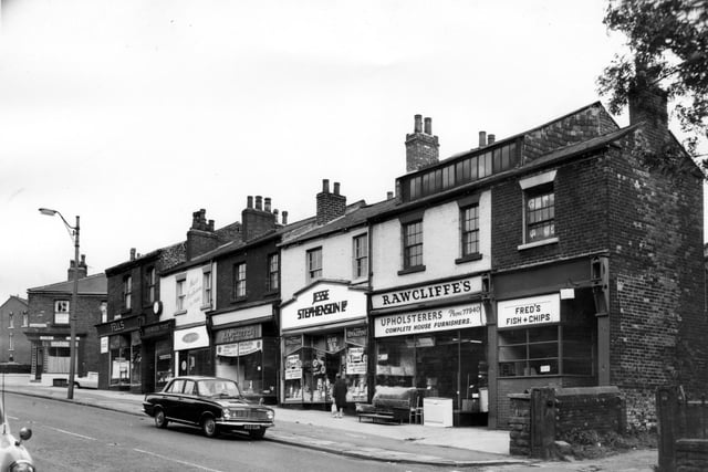 Beeston Road to a parade of shops, some with residential accommodation above. Far left is the junction with South Mount Street.