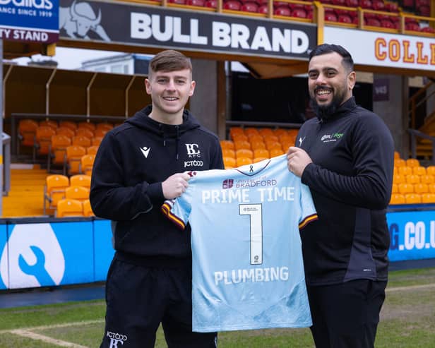 Bradford City AFC midfielder Bobby Pointon and Prime Time Plumber owner Usman Aswat