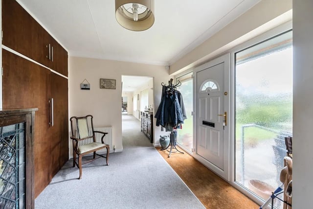 A welcoming reception hall gives access to a useful cloak’s cupboard and all the principal rooms of the property.