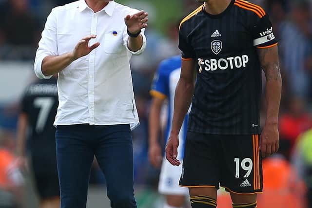 BRIGHTON, ENGLAND - AUGUST 27: Leeds manager Jesse Marsch chats with captain Rodrigo at the final whistle during the Premier League match between Brighton & Hove Albion and Leeds United at American Express Community Stadium on August 27, 2022 in Brighton, England. (Photo by Charlie Crowhurst/Getty Images)