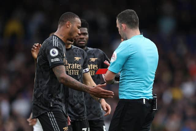 OFF THEN NOT: Arsenal defender Gabriel has his red card rescinded by referee Chris Kavanagh. Photo by Eddie Keogh/Getty Images.