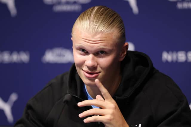 MANCHESTER, ENGLAND - JULY 10: Erling Haaland of Manchester City speaks to the media during a Press Conference at the Manchester City Summer Signing Presentation Event at Etihad Stadium on July 10, 2022 in Manchester, England. (Photo by George Wood/Getty Images)