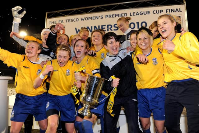 ROCHDALE, ENGLAND - FEBRUARY 11: Leeds Carnegie  players celebrate after victory in the FA Tesco Women�s Premier League Cup Final between Everton and Leeds Carnegie at Spotland Stadium on February 11, 2010 in Rochdale, England.  (Photo by Michael Regan/Getty Images)