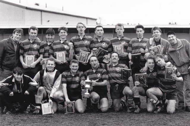 Third Division giant-killers Woodman Churwell are pictured with their awards after overcoming First Division Gardeners Arms 2-1 in extra-time in the final of the Leeds Combination League's Arthur Luty Cup at Farsley Celtic's Throstle Nest ground in April 1993.