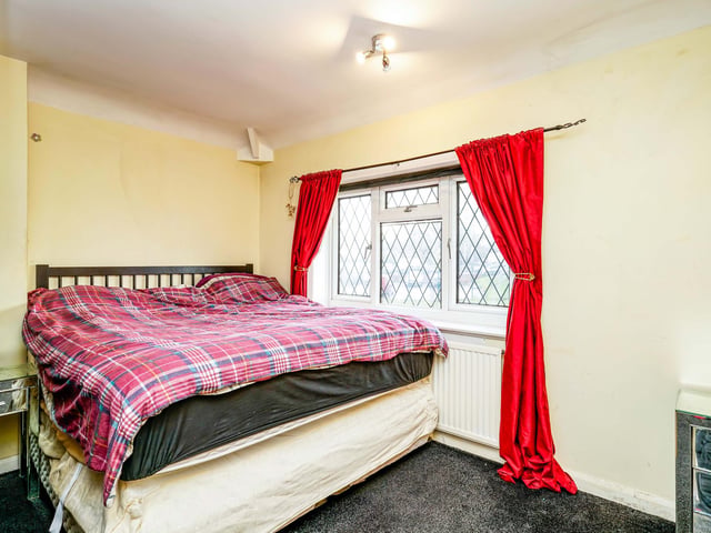 Leading upstairs are the two bedrooms and a family bathroom with both a bath and shower.