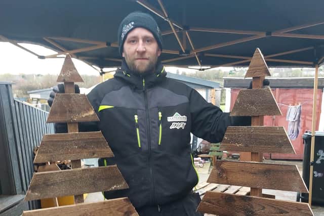 Landscape gardening boss Reese Fletcher, 30, and his team are hoping to raise £50,000 to buy Christmas presents for underprivileged children (Photo: Reese Fletcher/SWNS)