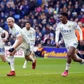 NINE ANSWER: Patrick Bamford, centre, pictured celebrating after firing Leeds United in front in Saturday's Championship clash at Cardiff City to make it three goals in his last three games. Picture by Nick Potts/PA Wire.