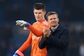 LEEDS, ENGLAND - JANUARY 22: Illan Meslier of Leeds United speaks with Jesse Marsch, Manager of Leeds United, as they applaud the fans after the Premier League match between Leeds United and Brentford FC at Elland Road on January 22, 2023 in Leeds, England. (Photo by Stu Forster/Getty Images)