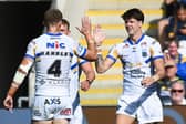 Riley Lumb, right, celebrates after completing his hat-trick in Leeds Rhinos' big win at York Knights. Picture by Matthew Merrick/SWpix.com.