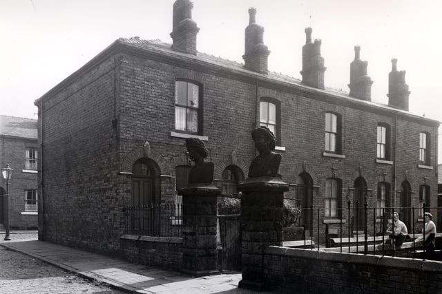 Part of Oatland Avenue, showing the gardens between the houses this formed the short length of the avenue, which was 'L' shaped. These were through houses, the row to the right faced onto Camp Road (Oatland Lane). The stone pillars which once would have supported gates are topped with distinctive stone heads.