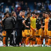 DEFIANT MOMENT - Leeds United players and fans united in a moment of mutual appreciation at full-time despite the defeat by Manchester City at the Etihad. Pic: Getty