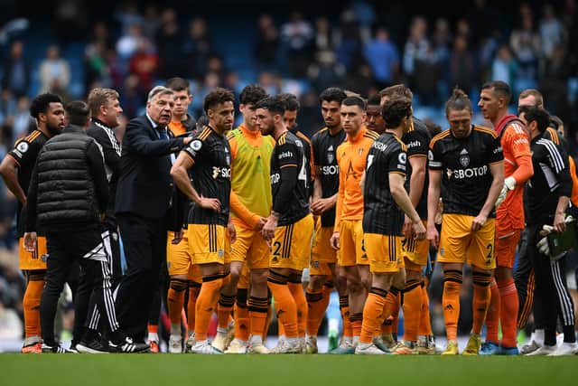DEFIANT MOMENT - Leeds United players and fans united in a moment of mutual appreciation at full-time despite the defeat by Manchester City at the Etihad. Pic: Getty