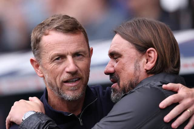 LONDON, ENGLAND - SEPTEMBER 17: Gary Rowett, Manager of Millwall, and Daniel Farke, Manager of Leeds United, embrace prior to the Sky Bet Championship match between Millwall and Leeds United at The Den on September 17, 2023 in London, England. (Photo by Alex Pantling/Getty Images)