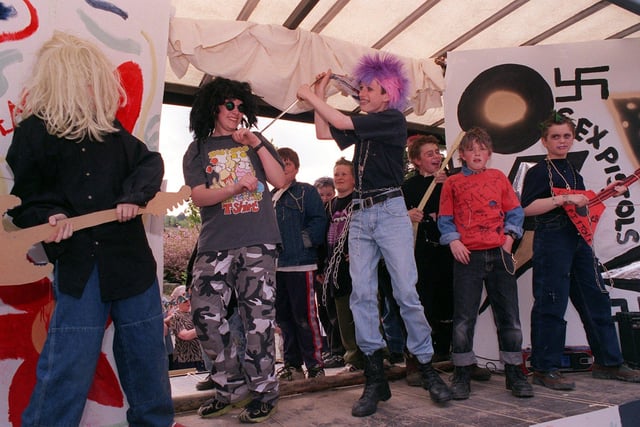Scouts from the Ben Rhydding troop re-enact the 1970's punk craze during the Ilkley Carnival parade in May 1999.