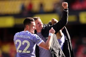 WATFORD, ENGLAND - APRIL 09: Jack Harrison and Jesse Marsch, Manager of Leeds United celebrate with fans after their sides victory during the Premier League match between Watford and Leeds United at Vicarage Road on April 09, 2022 in Watford, England. (Photo by Alex Morton/Getty Images)