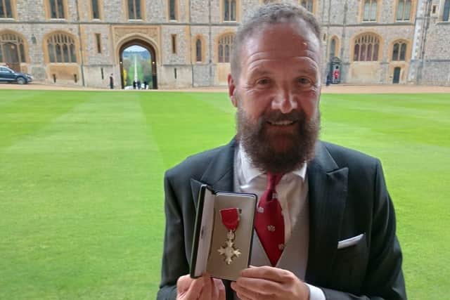 Kevin Kiely with his MBE at Windsor Castle
