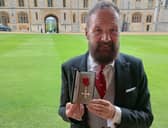 Kevin Kiely with his MBE at Windsor Castle