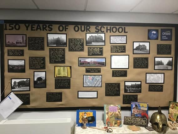 Our History display inside the main entrance of school.