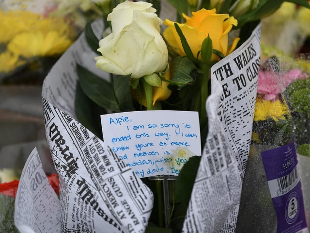 Flowers have been left near to the scene of the crime, along with notes like this one that reads: "I am so sorry it ended this way. I wish that you are at peace and heaven is beautiful."