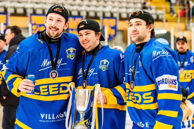 PARTY TIME: Matt Barron (left), Noah McMullin and Leeds Knights' team-mate Mac Howlett celebrate winning the NIHL National league championship. Picture: Kev Bland/Knights Media.