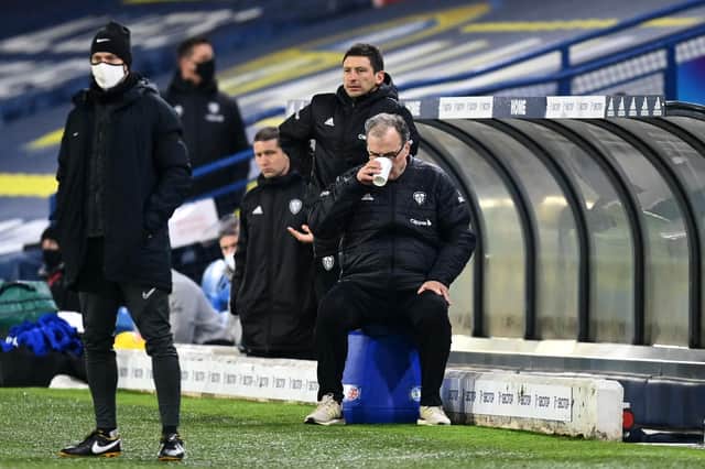 Marcelo Bielsa, manager of Leeds United, takes a drink whilst sat on his bucket during the Premier League match between Leeds United and Everton at Elland Road on February 3, 2021