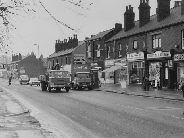 Dewsbury Road in November 1979. Shops in focus are Tthurston's, William Hill, Green Bros, Collinsons, Discount Motors Accessories and Jones TVs.