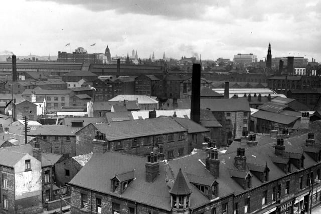 An elevated view from Christ Church, Meadow Lane, looking north-west over the city. Several factory chimneys are visible among the roofs. Pictured in June 1955.