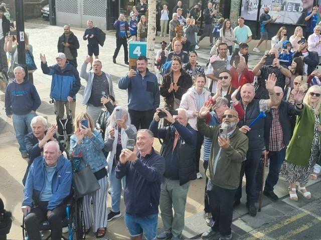 Fans along the route.
