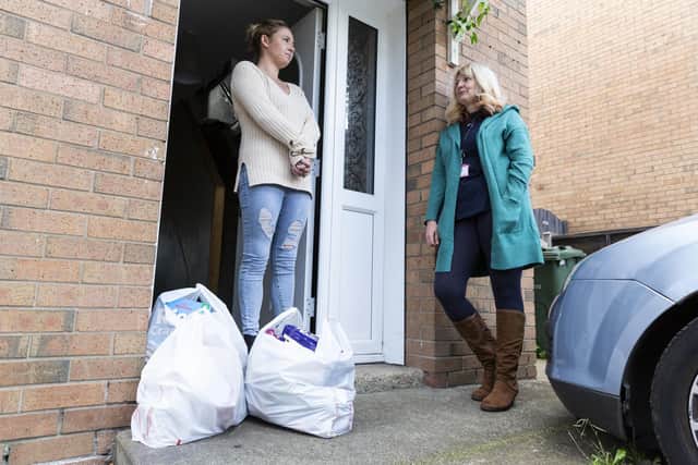 Wrenthorpe Kirkhamgate Assist food bank founder Nic Standby, 54, delivers food to single mum-of-two Beth.  Picture: Lee Mclean/SWNS.