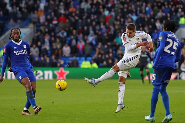 UP AND RUNNING: Leeds United new boy Max Wober fires in a shot on his Whites debut in Sunday's third round FA Cup clash at Cardiff City. 
Photo by GEOFF CADDICK/AFP via Getty Images.