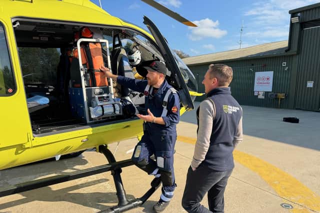 Paul Hanagan is shown around the Yorkshire Air Ambulance helicopter