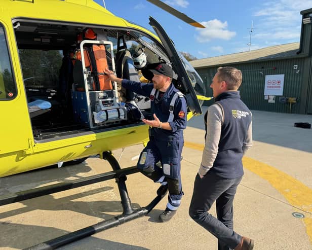 Paul Hanagan is shown around the Yorkshire Air Ambulance helicopter