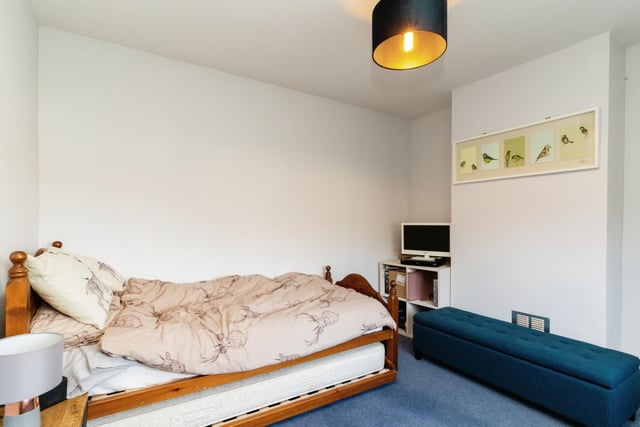 To the first floor are three double bedrooms, all with space for storage.