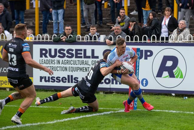 Jack Broadbent scores for Rhinos against Castleford at the Jungle in 2021. Picture by Bruce Rollinson.