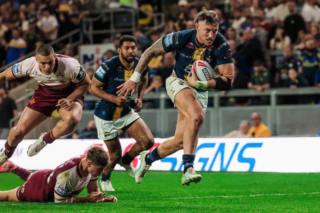 Chris Hankinson scores Leeds Rhinos' ninth try in the 52-0 rout of Huddersfield Giants. Picture by Alex Whitehead/SWpix.com.