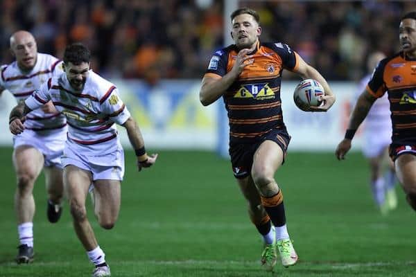 Greg Eden races clear to score for Tigers against Wakefield. New coach Andy Last has promised an attacking style of rugby.  Picture by John Clifton/SWpix.com.