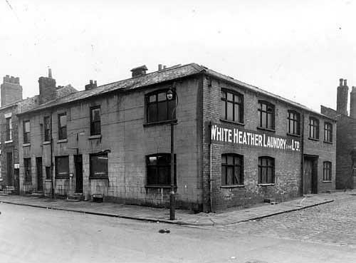 November 1959 and pictured is the White Heather Laundry. Wordsworth Street is on the left and Bateson Row is on the right.
