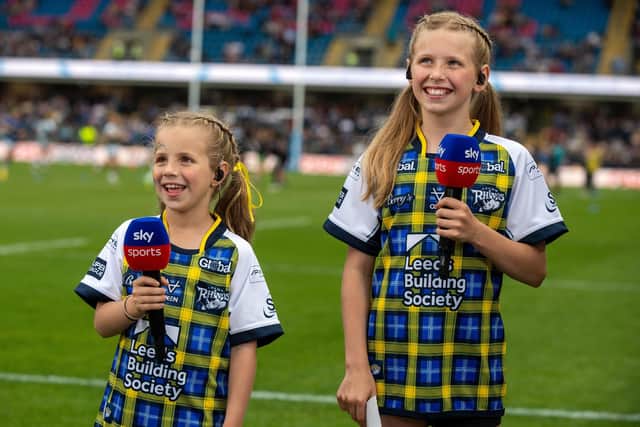 Rob Burrow's daughters Macy and Maya on Sky Sports before Rhinos' MND awareness game on Friday. Picture by Bruce Rollinson.
