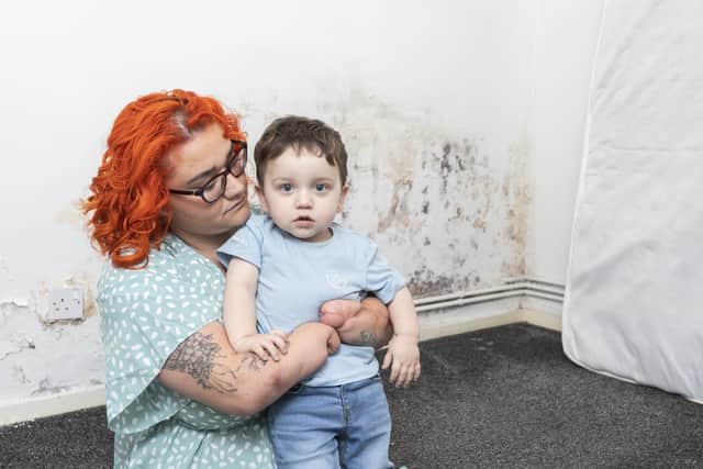 Danielle Bailey with her son Teddy, 18 months, pictured at her home in Otley. The mum-of-one has been living with the mould since the start of this year and Leeds City Council have been slow to respond, she claims.