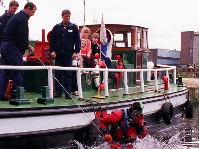 A diver from the West Yorkshire Police Underwater unit  gets in the swim of things at the Leeds Waterside Festival.