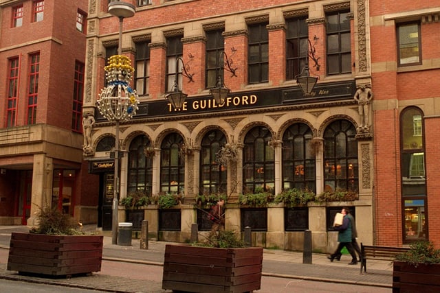 The Guildford Hotel was built in 1900 and was originally situated at number 6 Guildford Street, hence the name. Guildford Street became part of The Headrow after road widening took place in the 1930s. Pictured in January 1996.