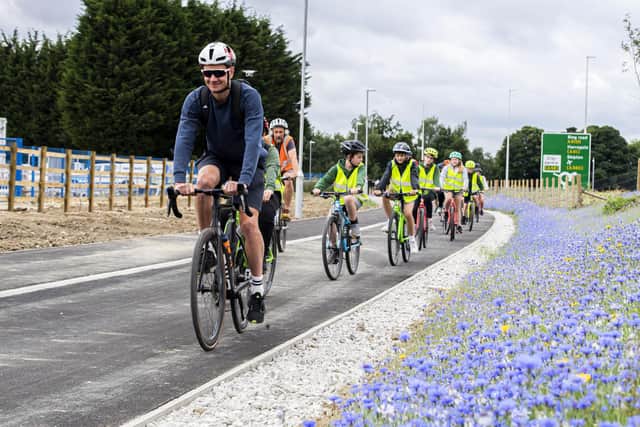 The Dewsbury born Olympian joined pupils and staff of Highfield Primary School ahead of the routes official opening. Picture: Leeds city council.