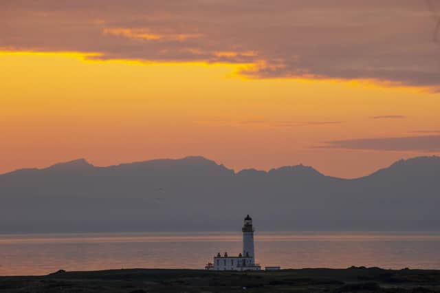A glowing sunset was captured on the coast behind Ayrshire's scenic Turnberry Trump golf course