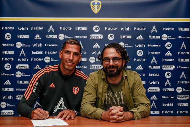 Leeds United goalkeeper Joel Robles with director of football Victor Orta.